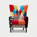 Sillón bergère tapizado en tela patchwork Imperial