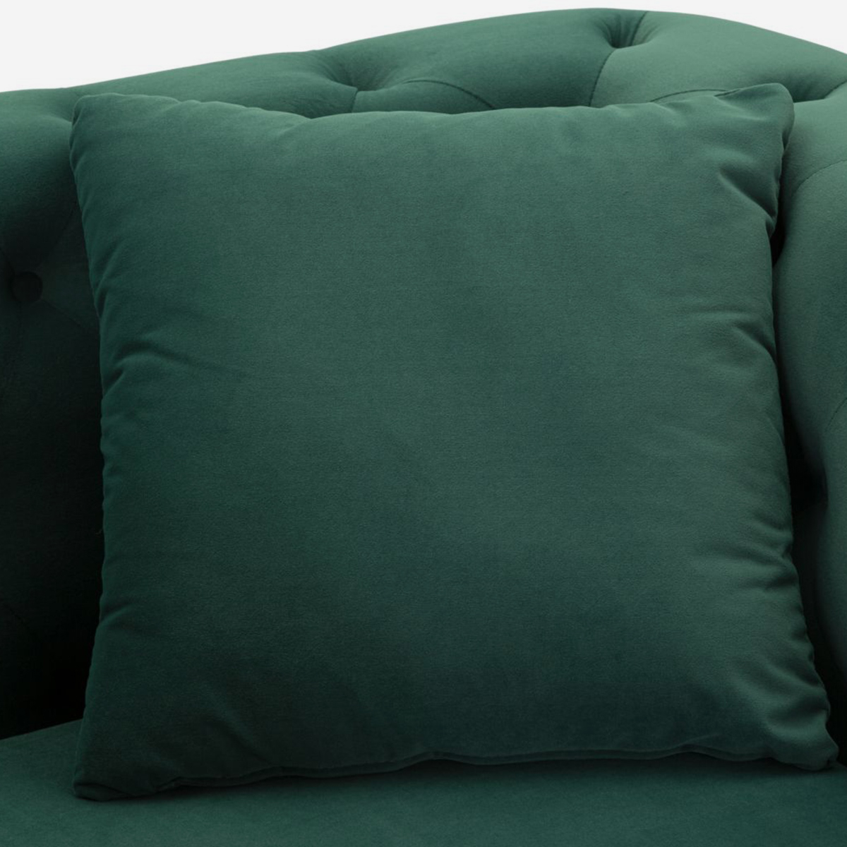 Sillón tapizado en terciopelo con cojín Emy