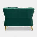 Sillón tapizado en terciopelo con cojín Emy