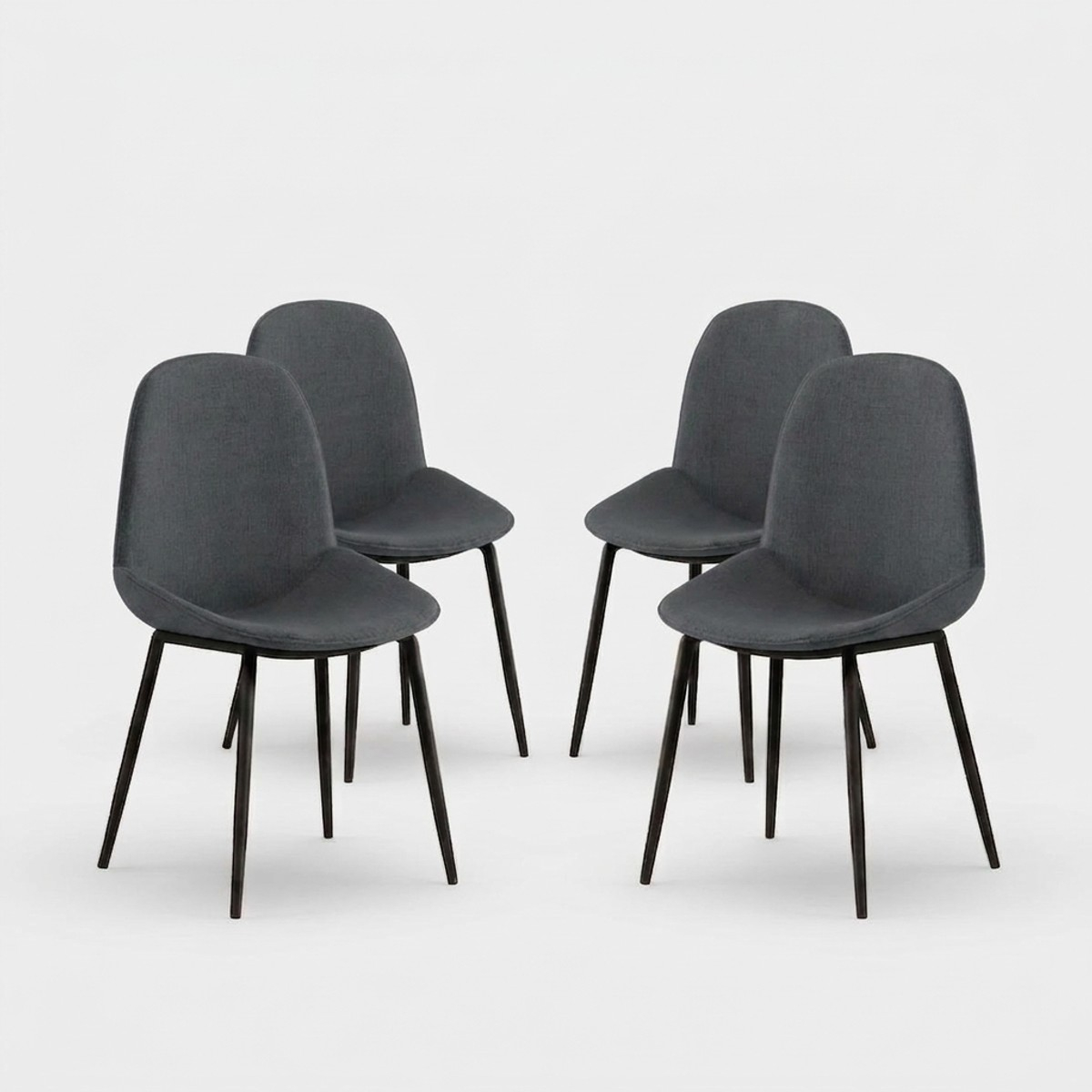 Set de 4 sillas de comedor tapizadas en tela Adhara