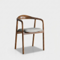 Silla de madera con asiento tapizado en tela Theris