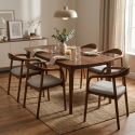 Silla de madera con asiento tapizado en tela Theris
