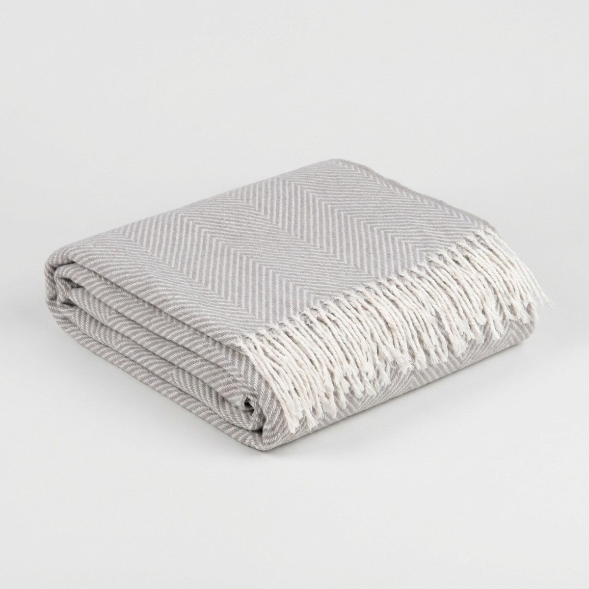 Coperta plaid da divano in maglia con frange Orleans